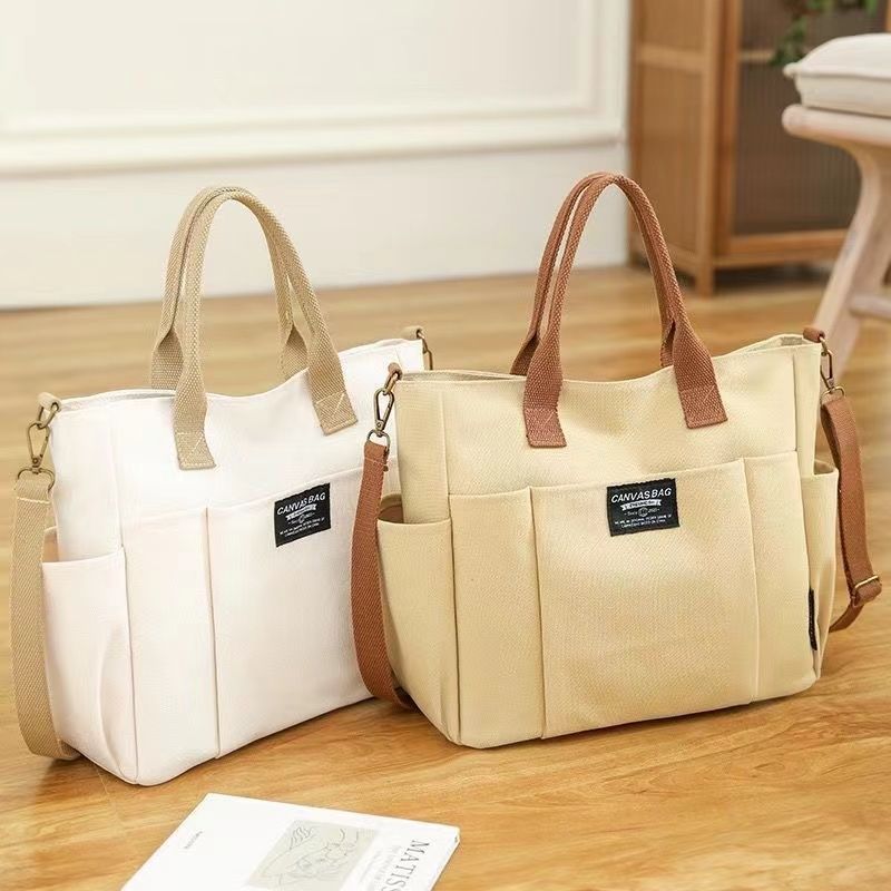 Grand sac toile canvas bandoulière — commuter grande capacité, port main ou épaule
